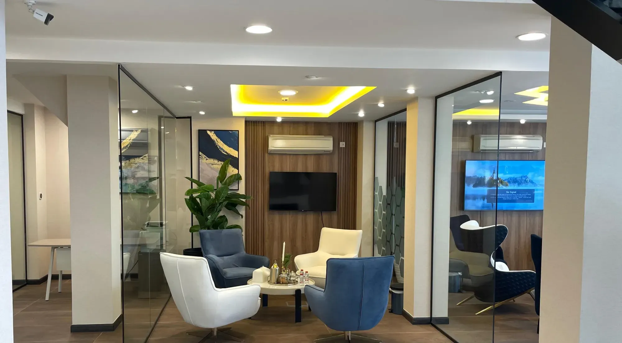 Glass meeting lounge with timber slatted wall